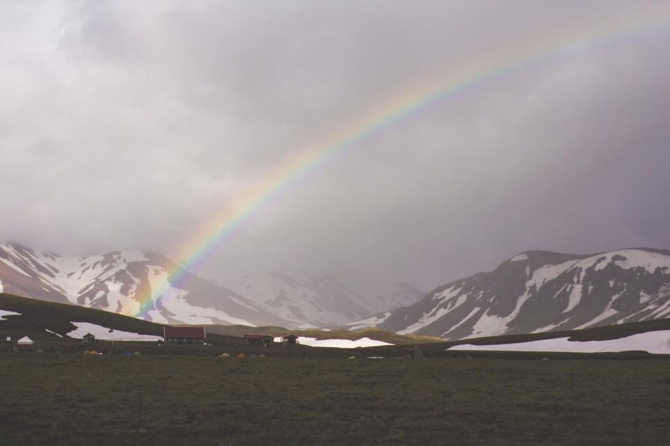 Free Image of Rainbow Over Mountain Range 