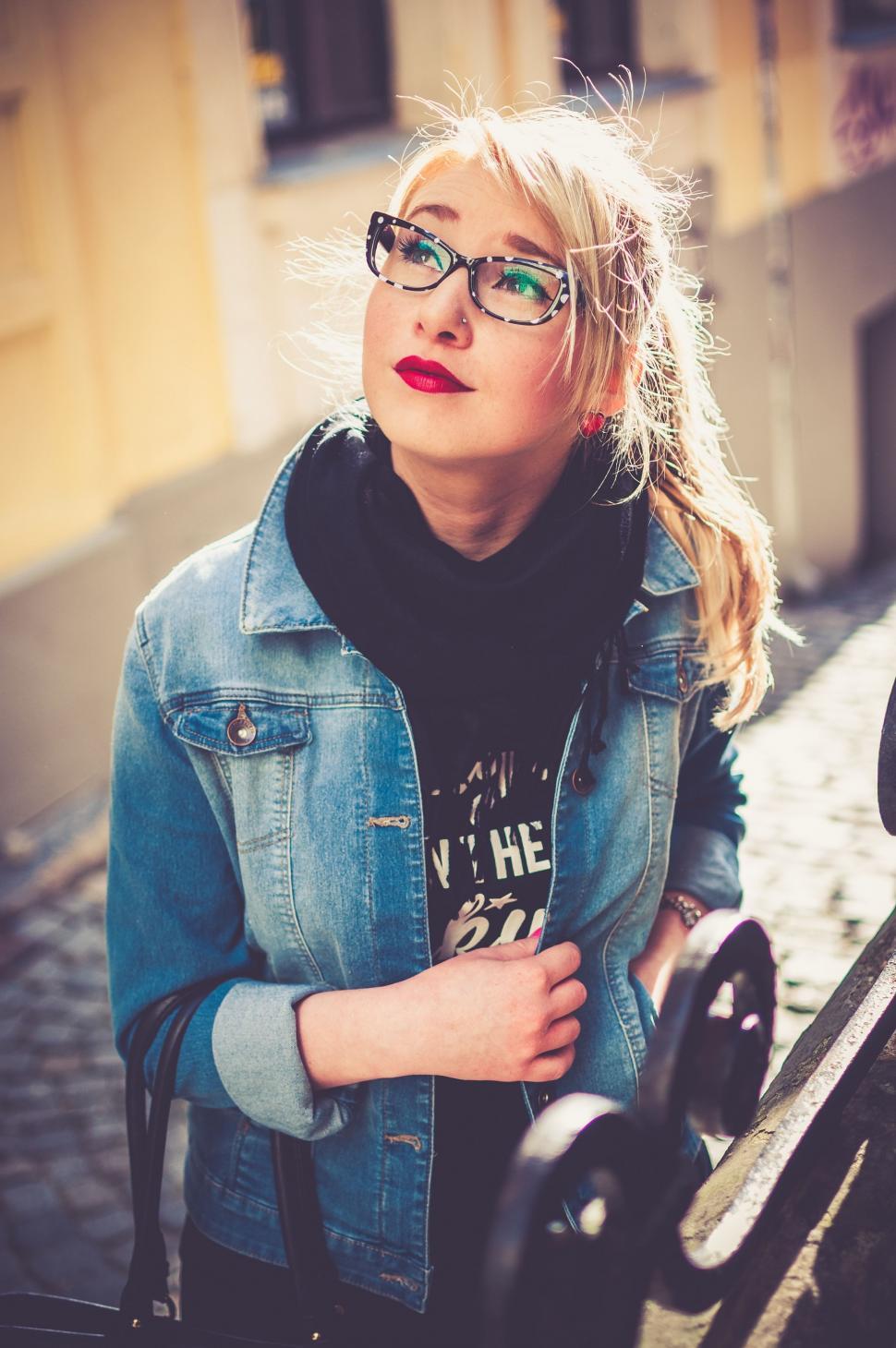 Free Image of Woman Wearing Glasses and Denim Jacket 