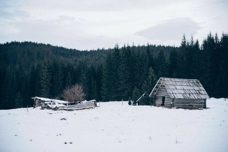 Free Image of Cabin in Snowy Field 
