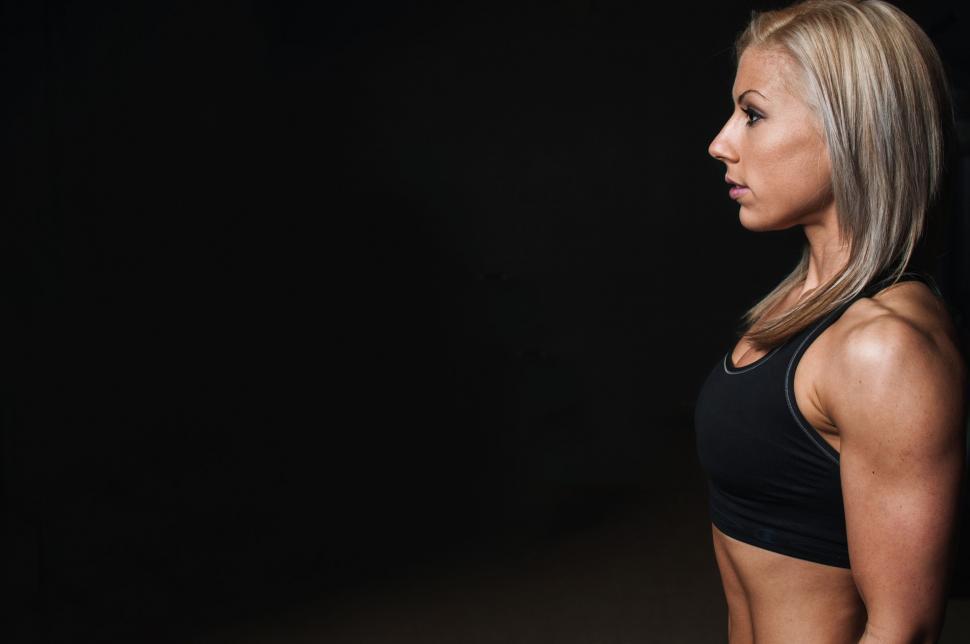 Free Image of Woman in Black Sports Bra Poses for Picture 