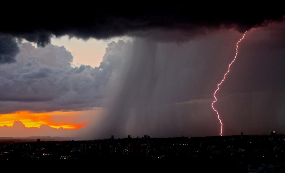 Free Image of Lightning Bolt Striking Through Cloudy Sky 