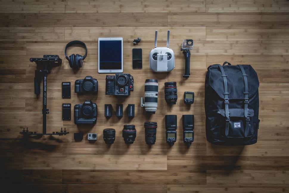 Free Image of Essential Travel Gear Arranged on Table 