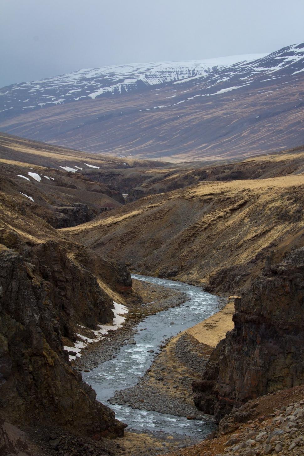 Free Image of River Flowing Through Mountain Valley 