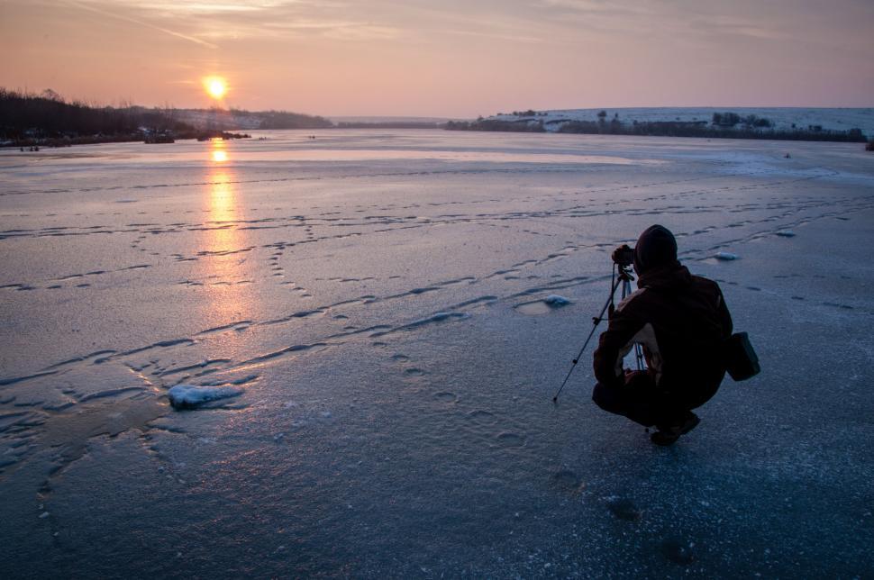 Free Image of Person Capturing Footage on Frozen Lake 