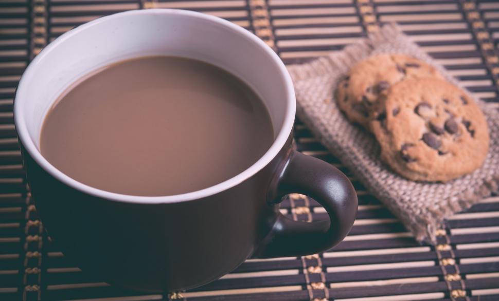 Free Image of Cup of Coffee and Cookie on Table 