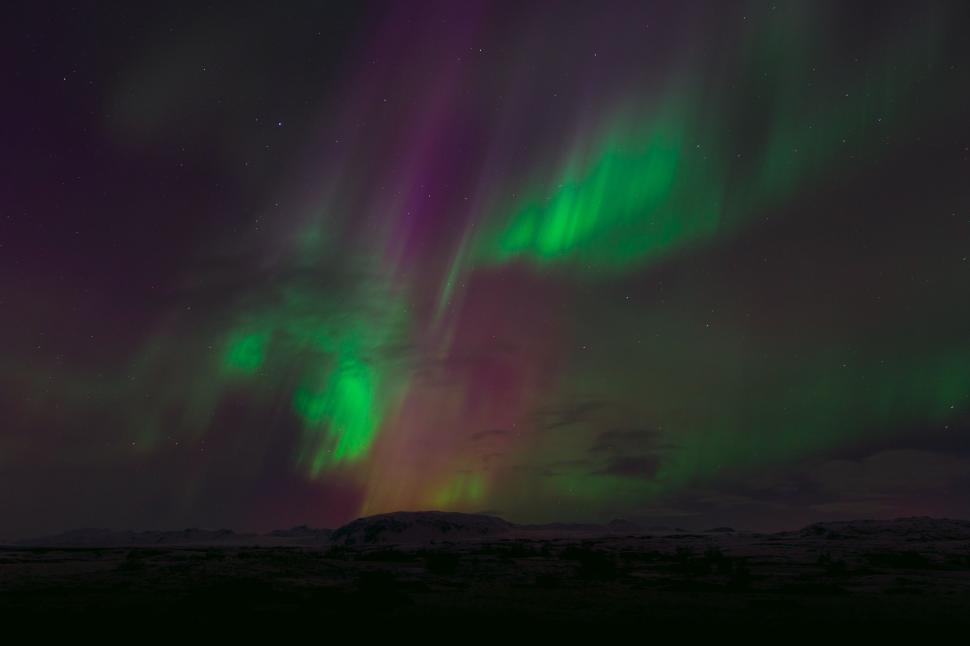 Free Image of Green and Purple Aurora Borealis Illuminating the Sky 