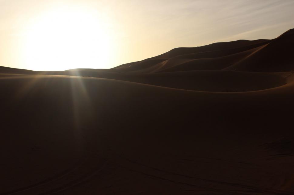 Free Image of The Sun Shines Over the Sand Dunes 