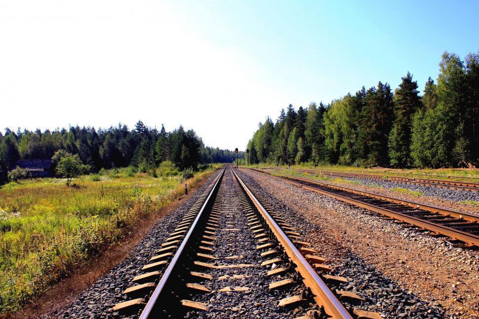 Free Image of Train Track With Trees in the Background 