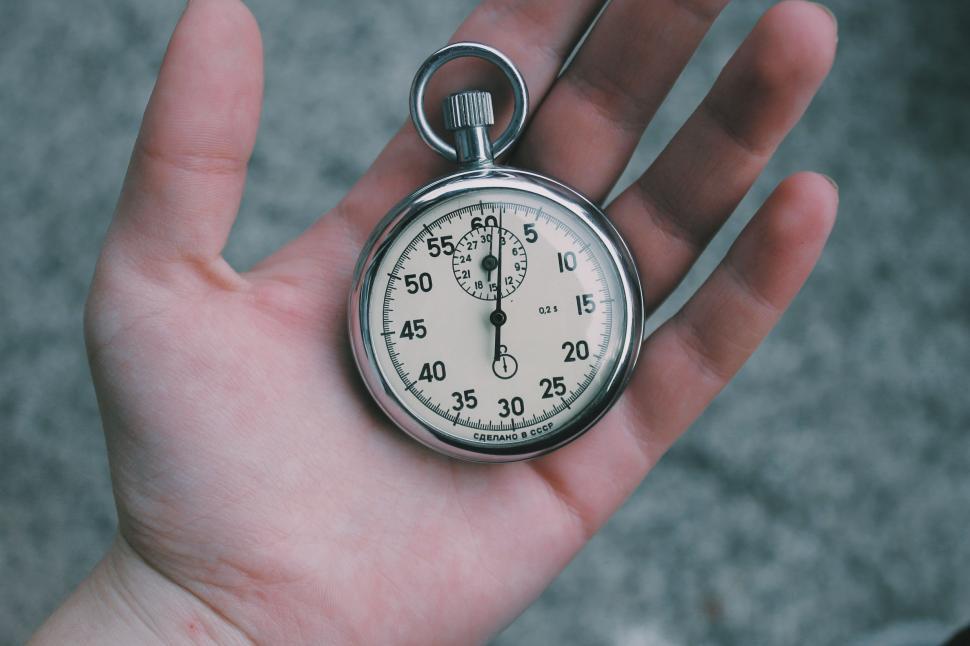 Free Image of Person Holding Pocket Watch 