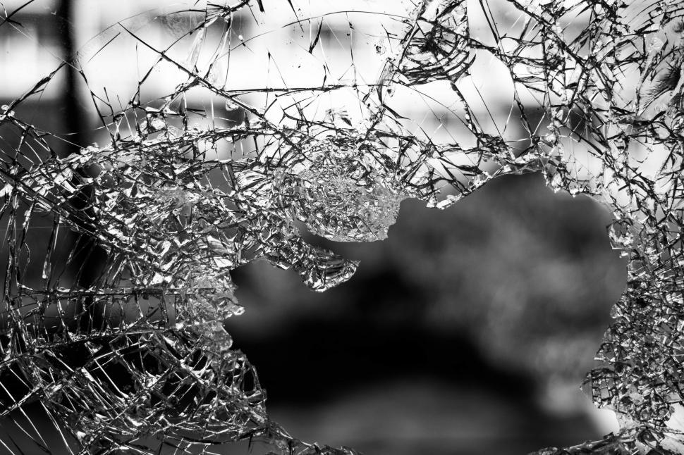 Free Image of A Broken Window in Black and White 