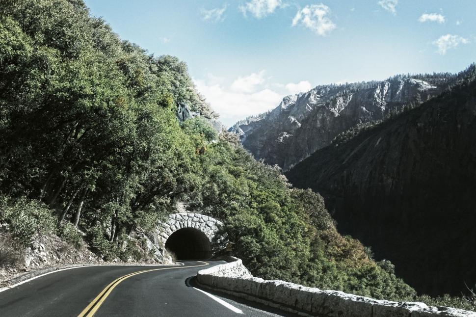 Free Image of Car Driving Through a Tunnel in the Mountains 