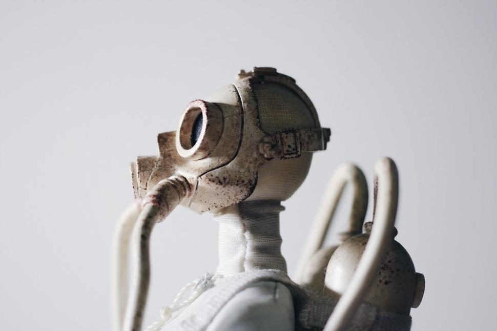 Free Image of Close Up of Toy Robot Wearing Gas Mask 