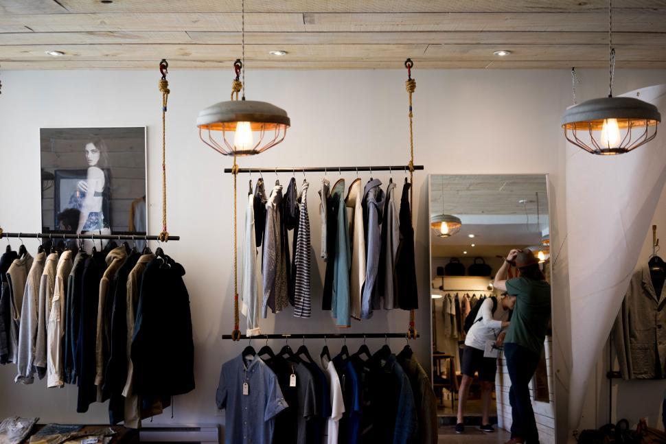 Free Image of Clothing Store With Numerous Clothes on Racks 