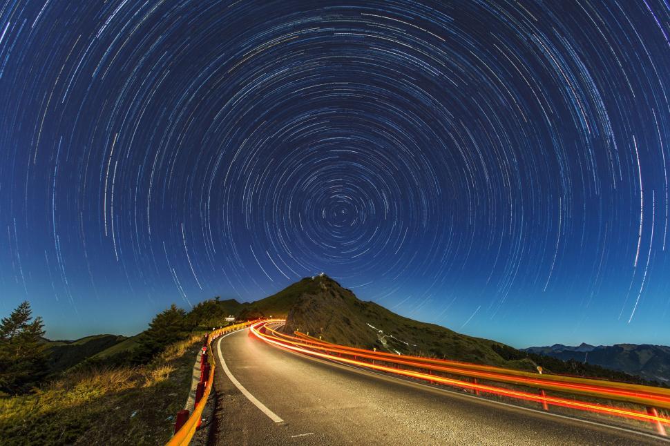 Free Image of Road With Star Trail in the Sky 