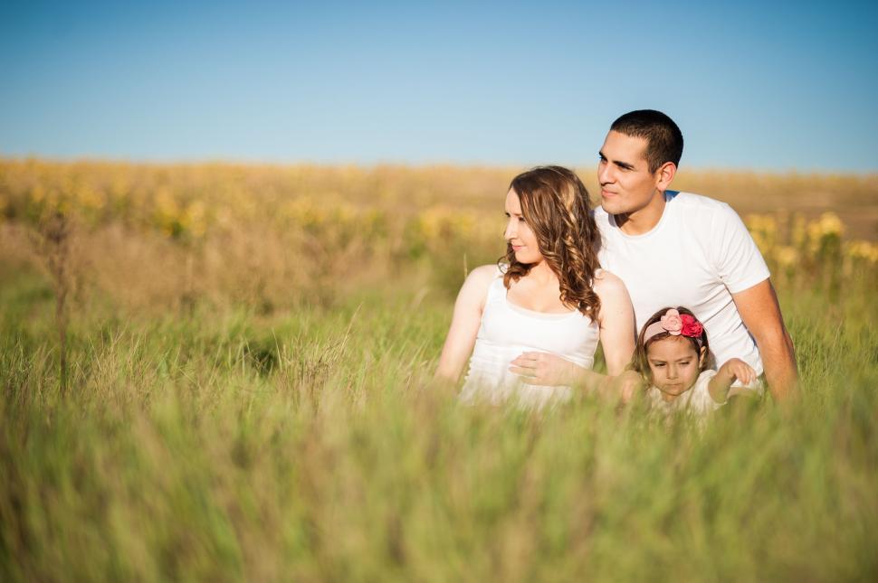 Free Image of Family With Two Children in Tall Grass Field 