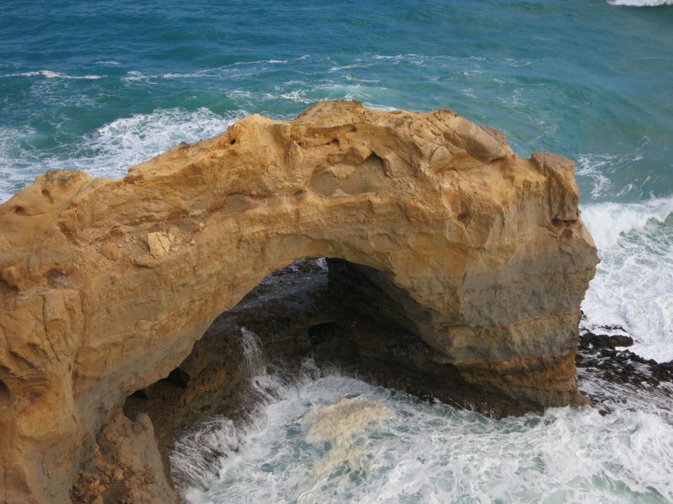 Free Image of Large Rock Formation in the Middle of the Ocean 