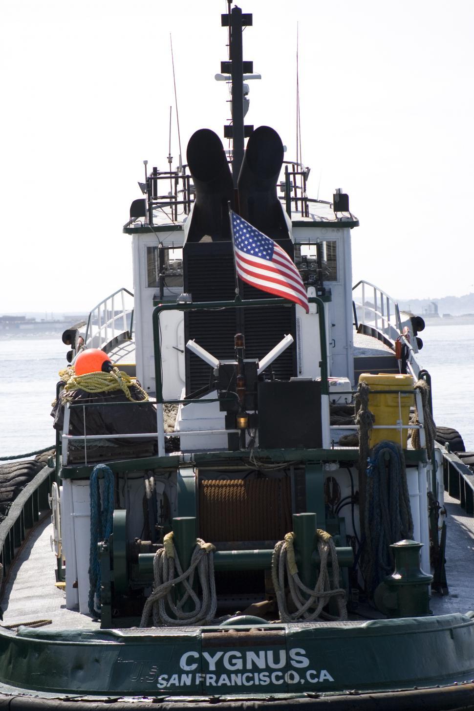 Free Image of Tug Boat With American Flag 