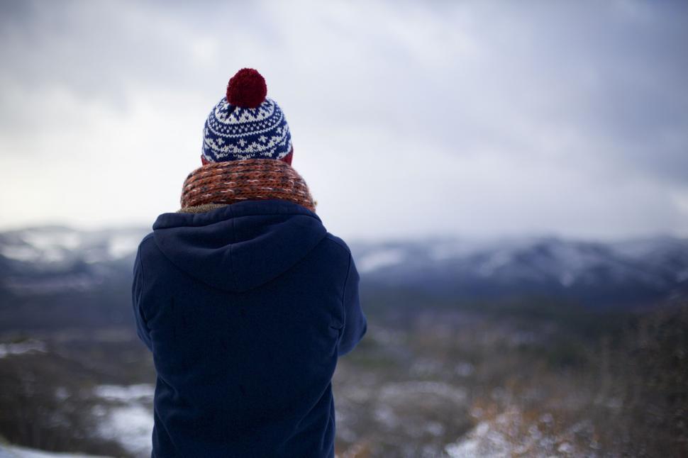 Free Image of Person Wearing Blue Jacket and Knitted Hat 