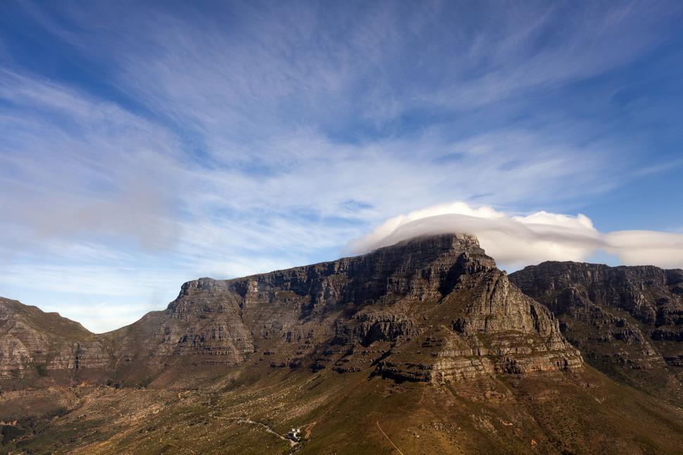 Free Image of Majestic Mountain Peak Reaching Towards the Clouds 