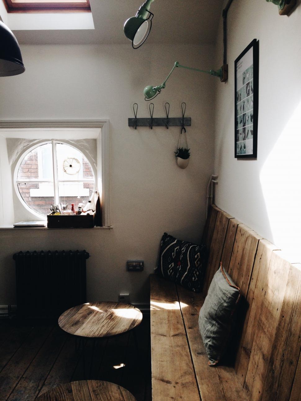 Free Image of Room With Wooden Bench and Window 