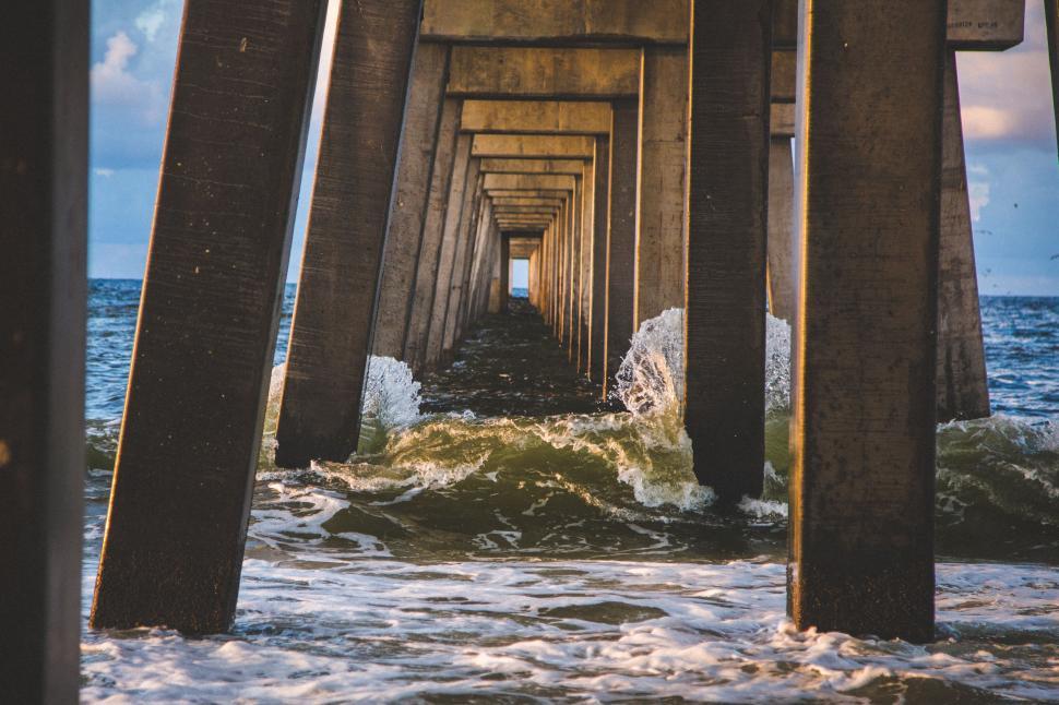 Free Image of Underneath a Pier: View of the Ocean 
