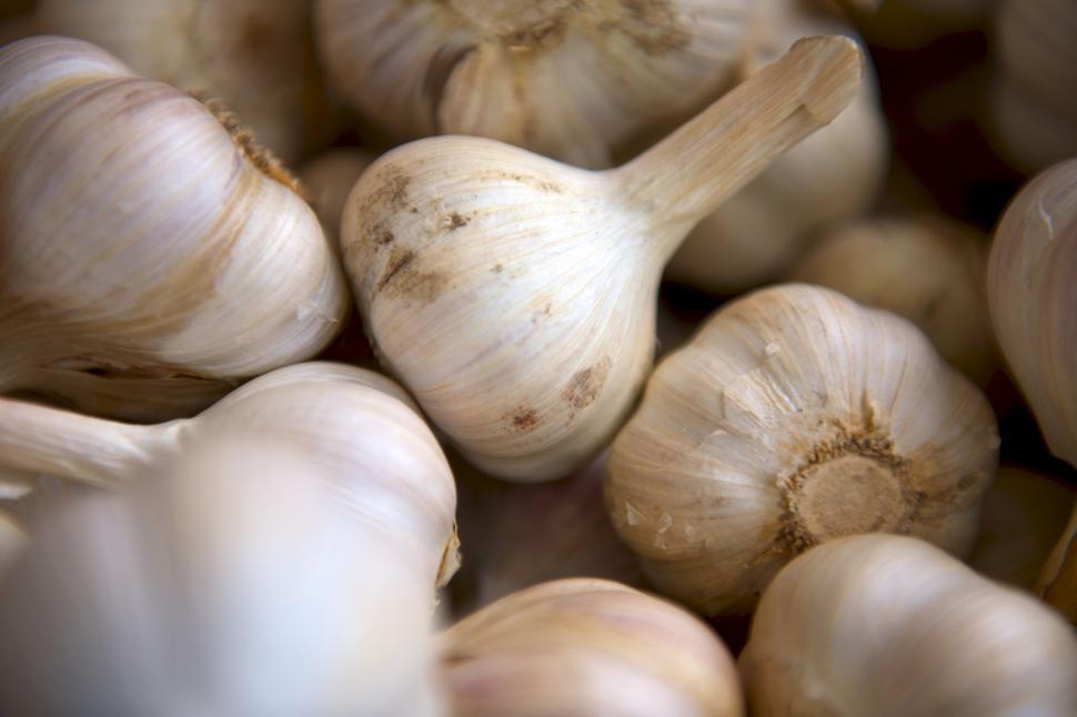 Free Image of Pile of Garlic Bulbs Arranged Neatly 
