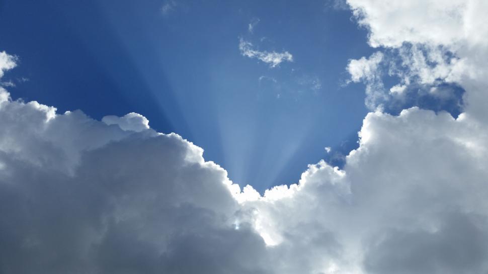 Free Image of Heart Shaped Cloud Floating in Blue Sky 