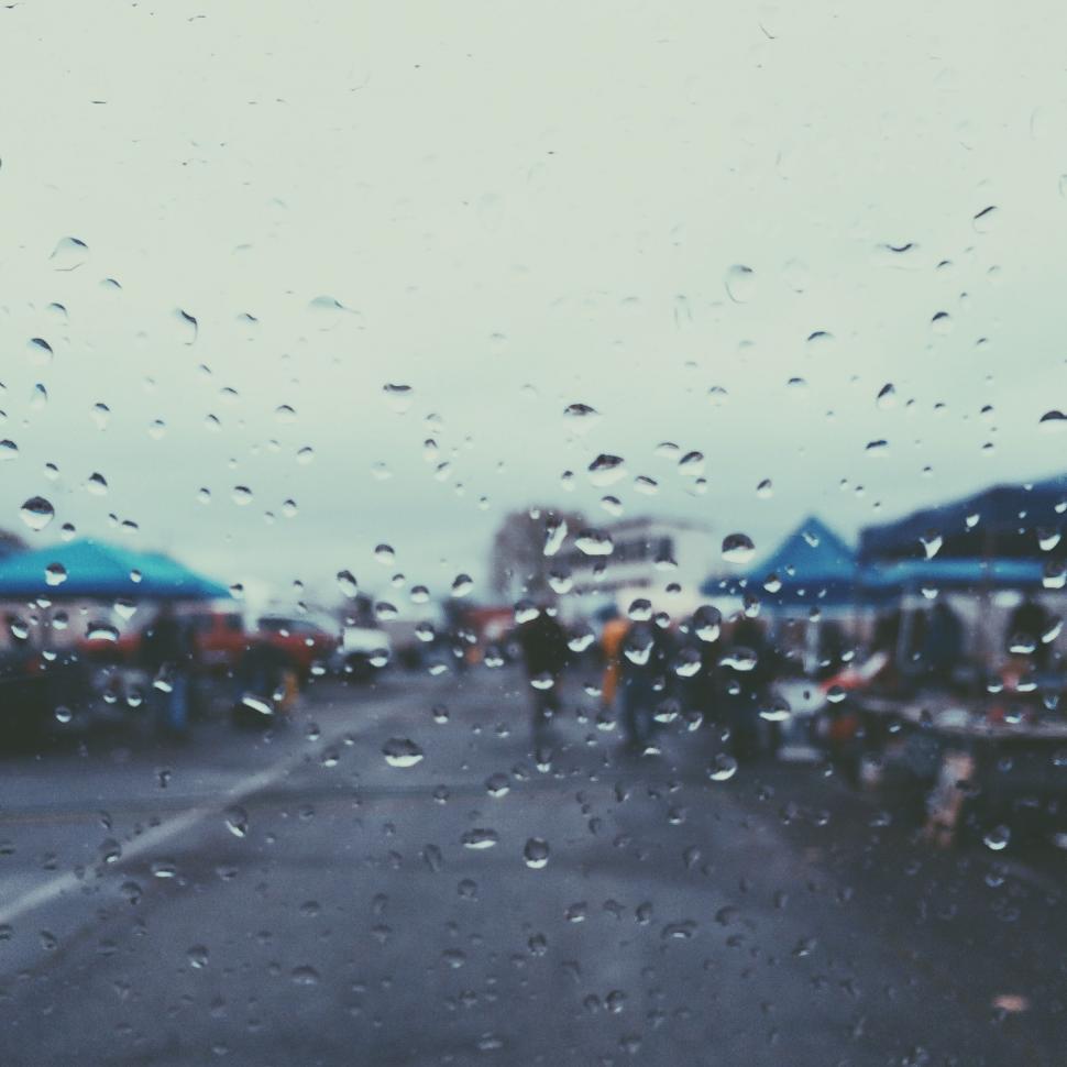 Free Image of A View of a Wet Street From a Car Window 