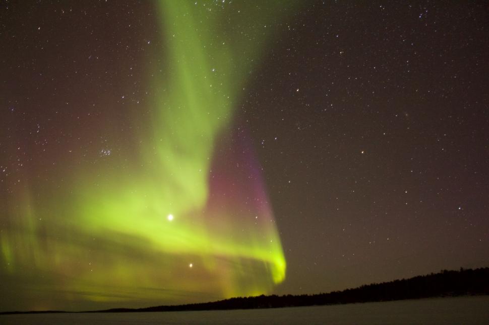 Free Image of Bright Green and Purple Aurora Bore in Night Sky 