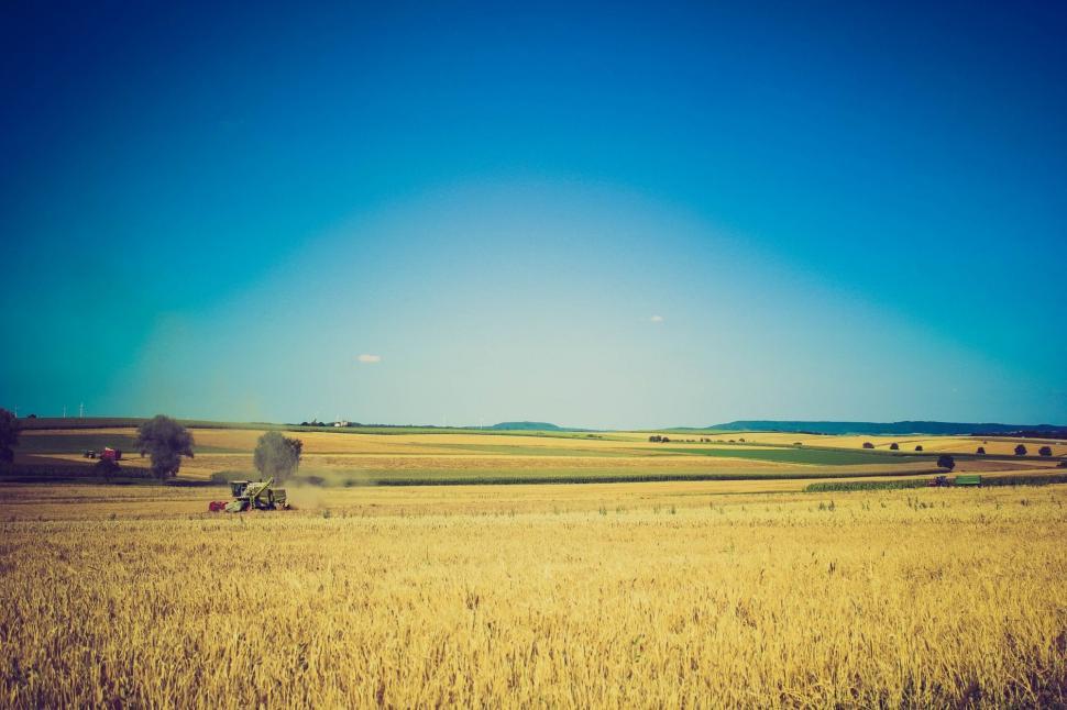 Free Image of Tractor in the Middle of a Field 