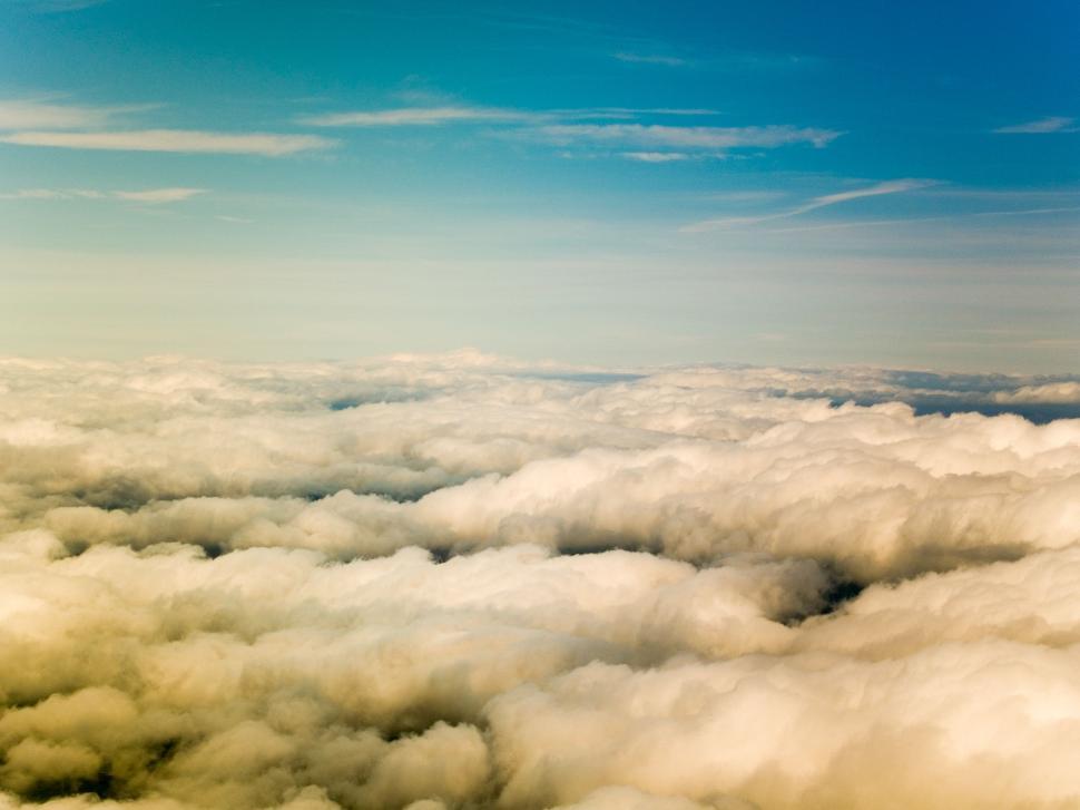 Free Image of A View of Clouds From an Airplane Window 