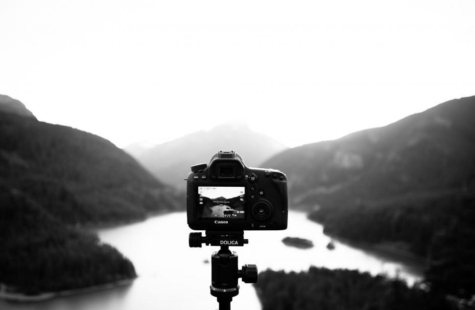 Free Image of Camera on Tripod in Black and White 