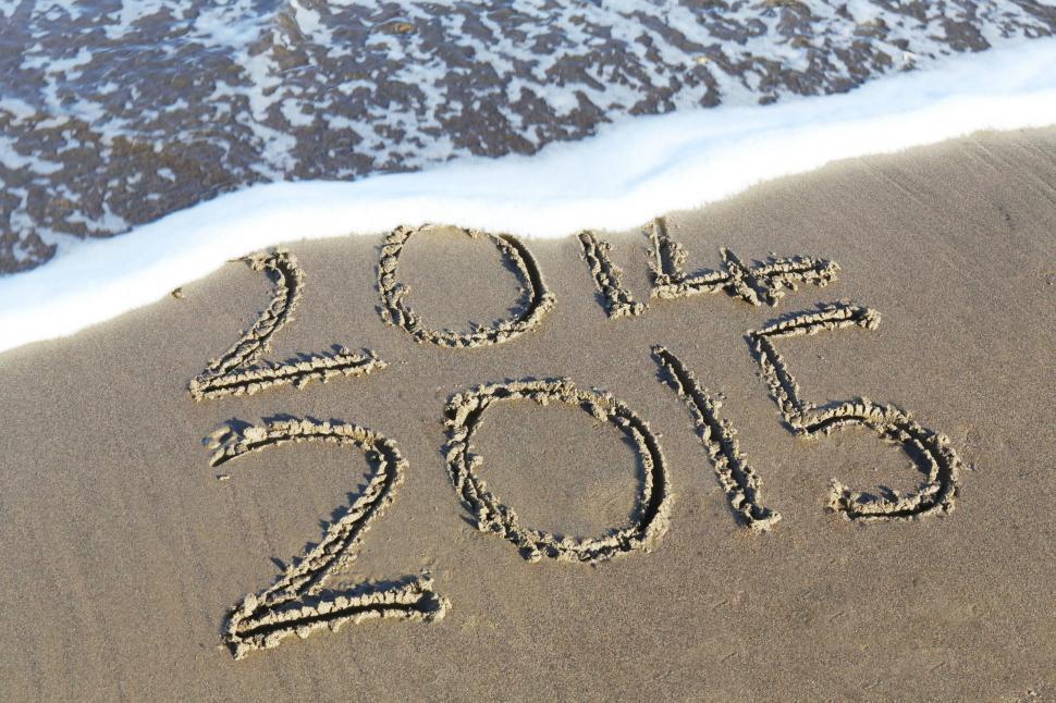 Free Image of Sandy Beach With 2013 Written in the Sand 