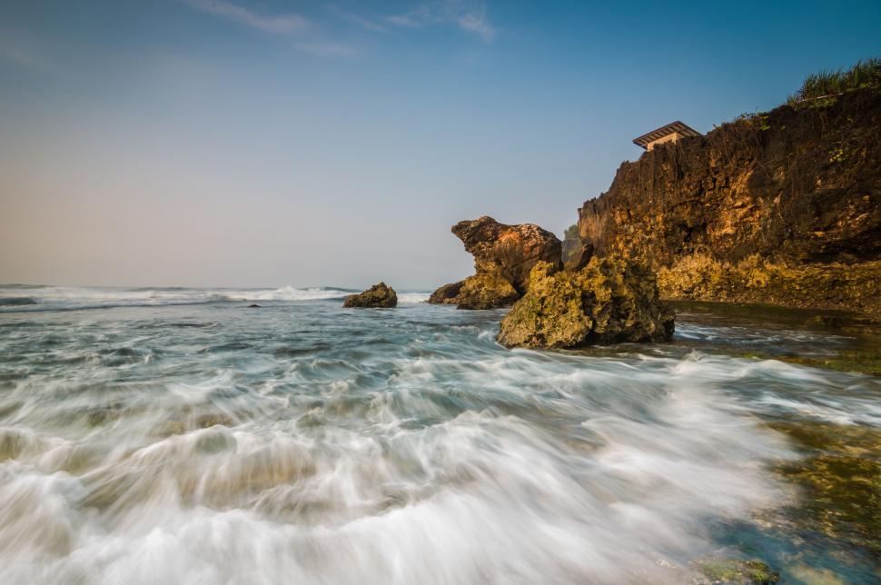 Free Image of Panoramic View of the Ocean From a Rocky Shore 