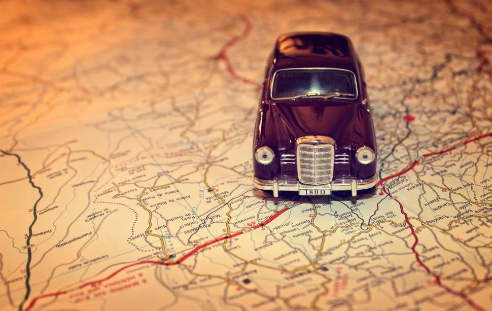 Free Image of Hit the road - Travel concept with vintage miniature car on road 