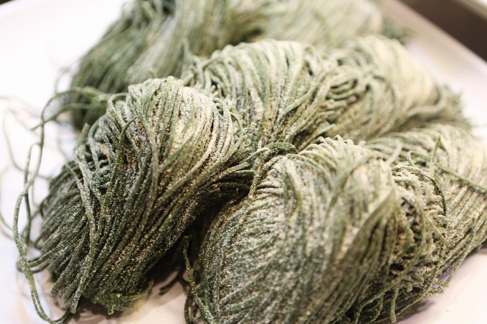 Free Image of Two Skeins of Yarn on Table 