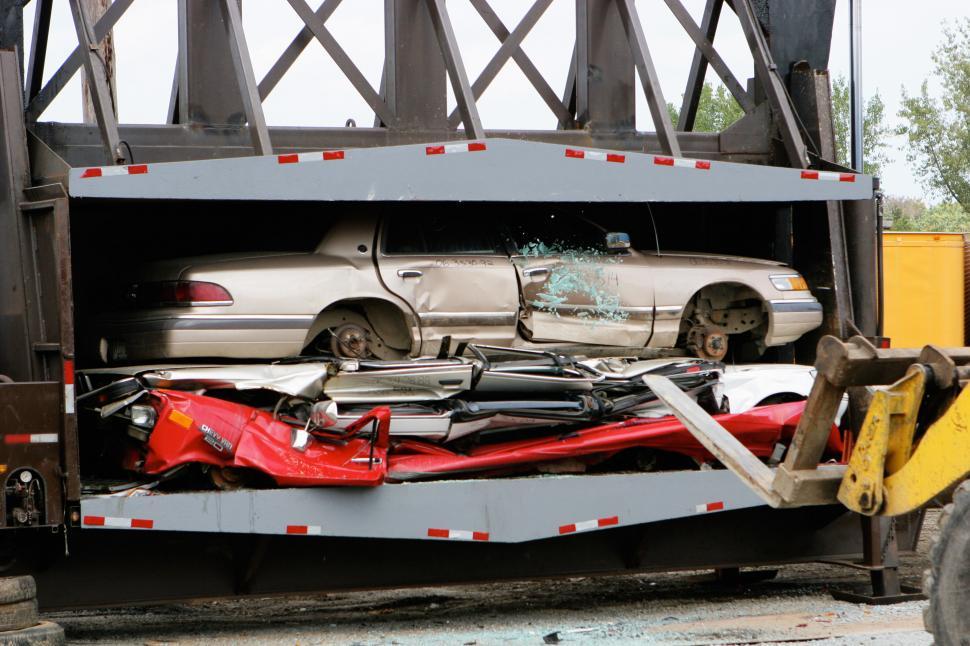 Free Image of Car Loaded in the Back of Truck 