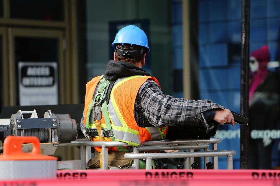 Free Image of Man Wearing Safety Vest and Hard Hat 