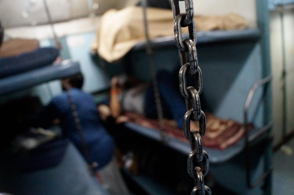 Free Image of Chain Hanging From Side of Boat 