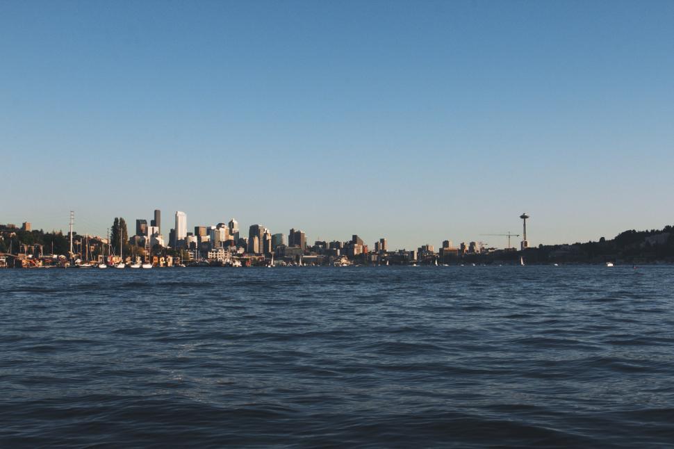 Free Image of Urban Cityscape Across Vast Water 