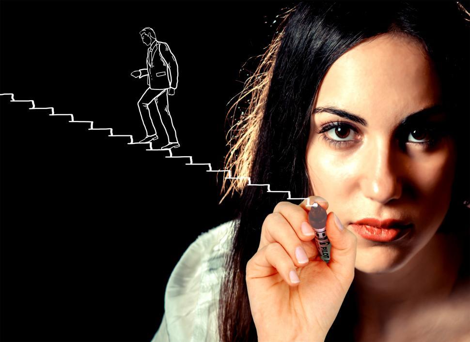 Free Image of Woman sketching a businessman climbing stairs - Career and succe 