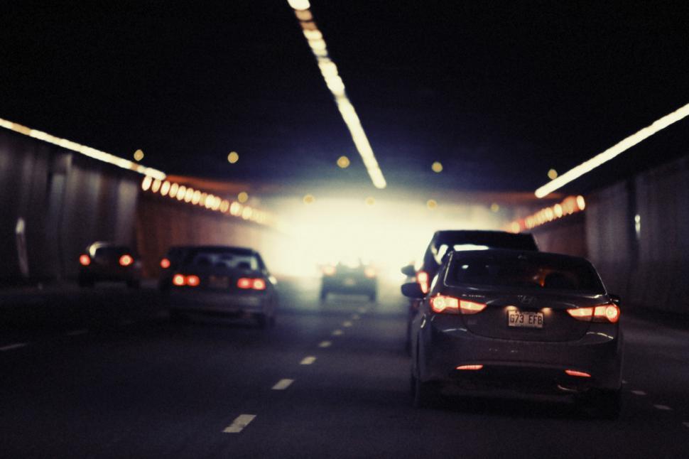 Free Image of Car Driving Through Tunnel at Night 