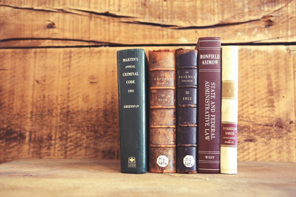 Free Image of Row of Books on Wooden Shelf 