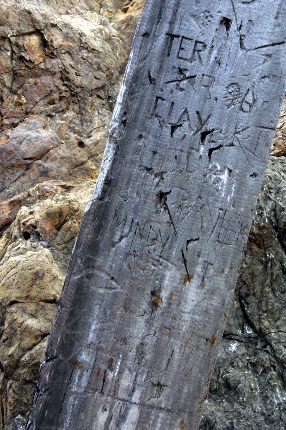 Free Image of beach fort bragg california shore ocean rocks sea shoreline coast coastal pacific glass board carve carved vandalized vandalize damage damaged deface defaced 