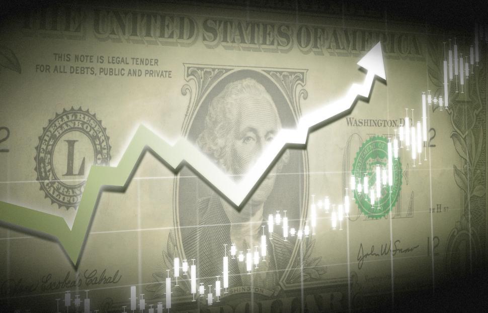 Free Image of Dollar bill with financial graph superimposed 