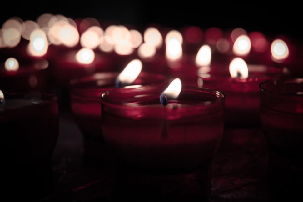 Free Image of Group of Lit Candles on Table 