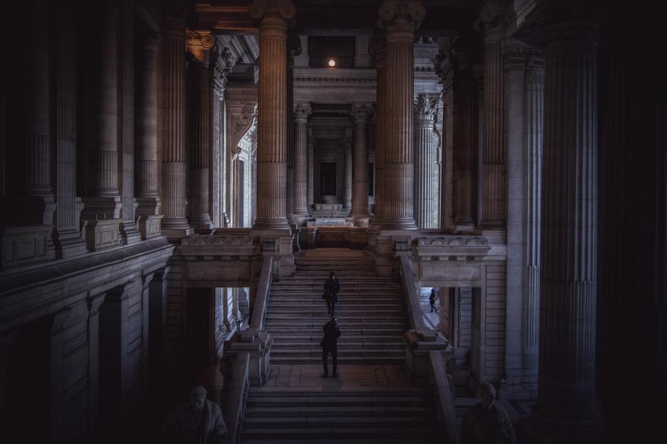 Free Image of Person Walking Down Stairs in Building 