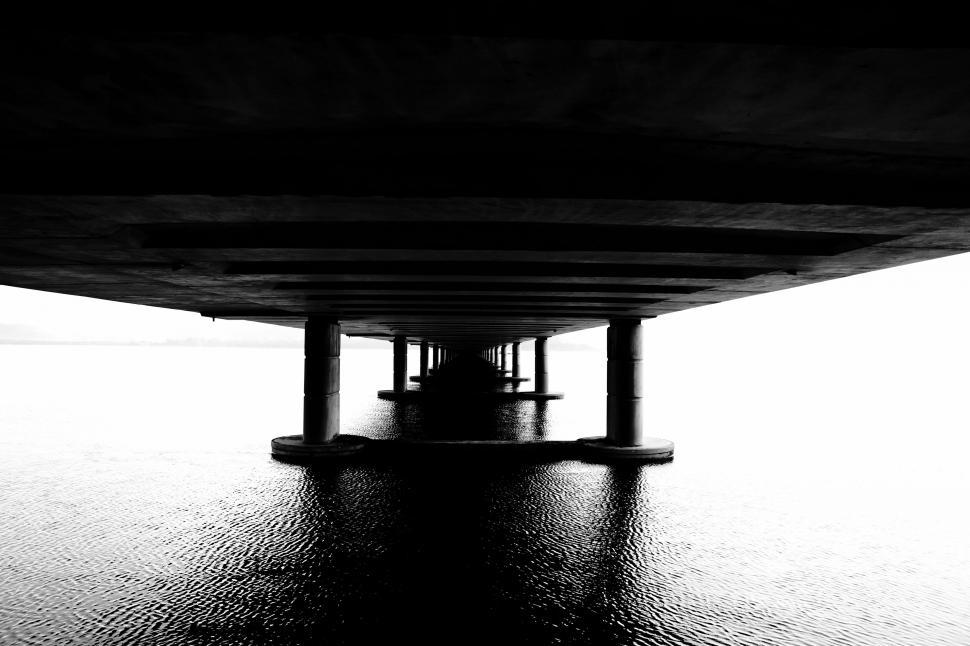 Free Image of Bridge Over Water in Black and White 