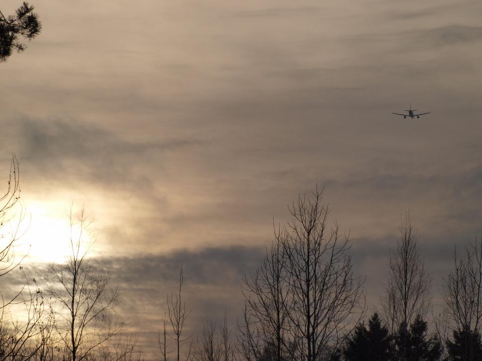 Free Image of Sunset and airplane 