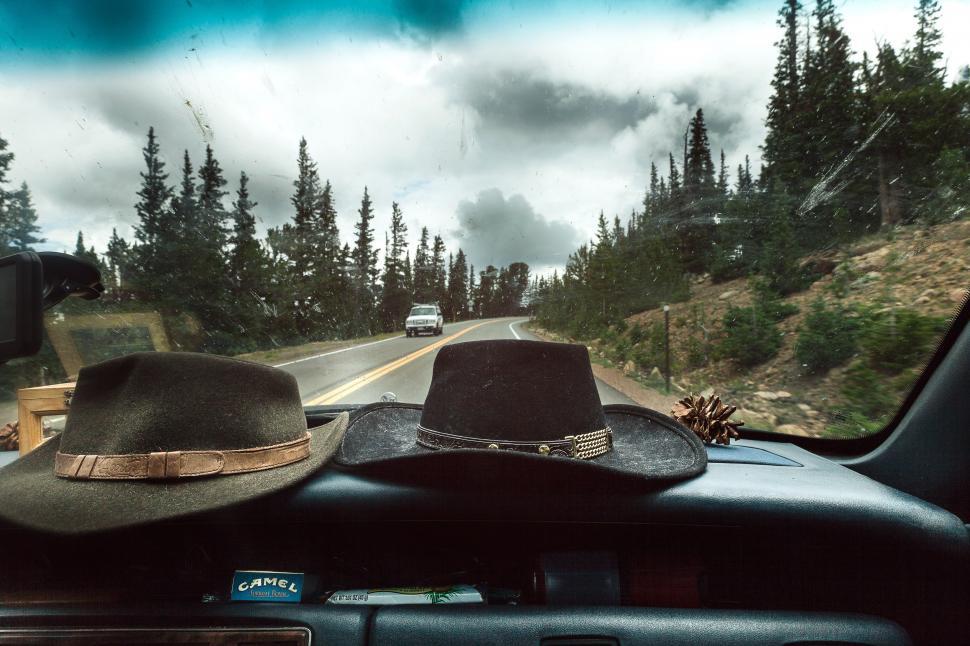 Free Image of Two Hats on Car Dashboard 